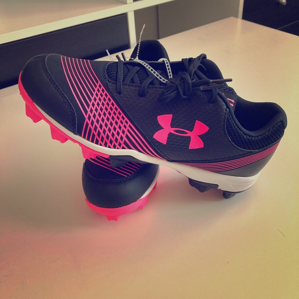 Brand new Under Armour black and pink cleats.
